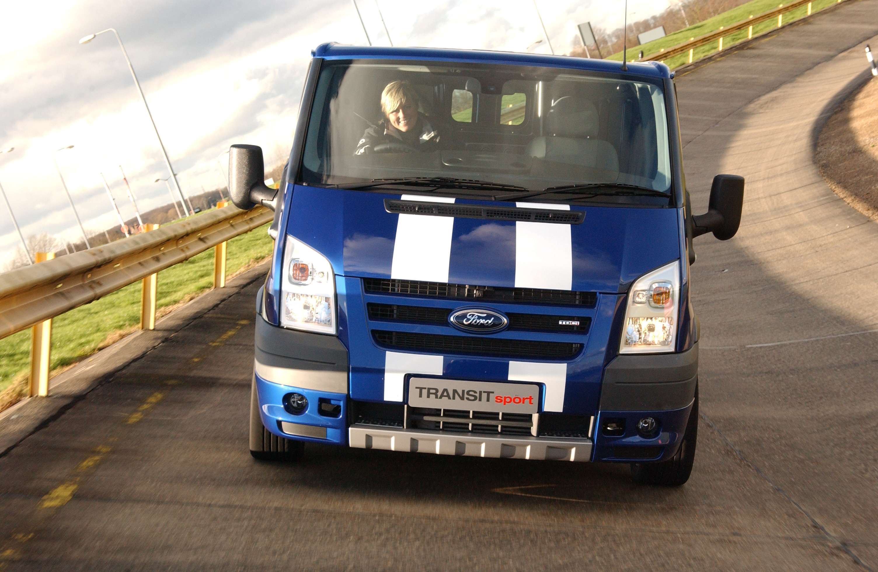 Sabine Schmitz behind the wheel of the Transit SportVan.